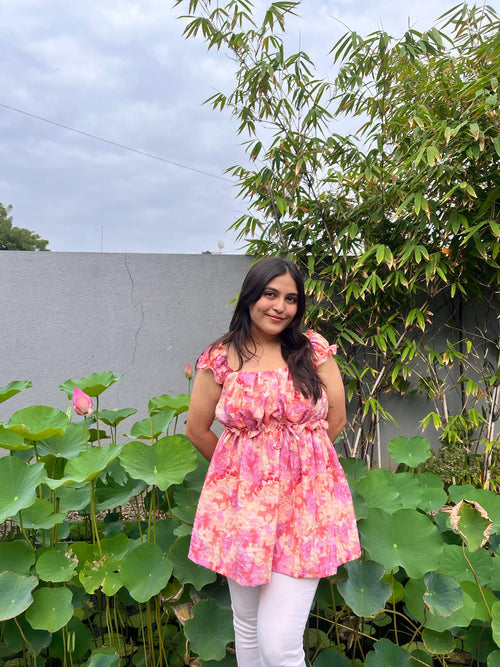 Coral peplum top