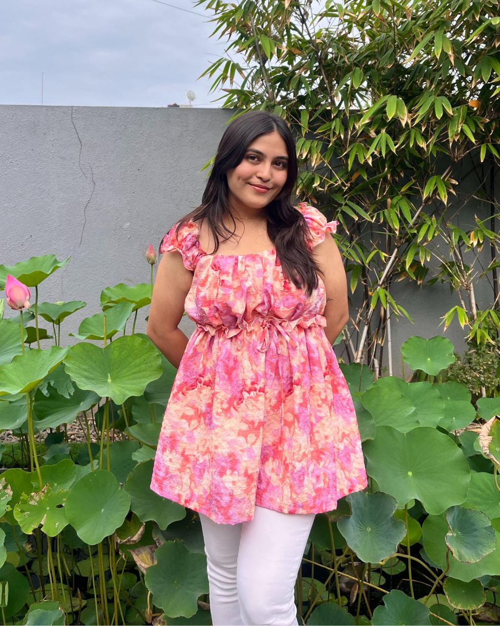 Coral peplum top