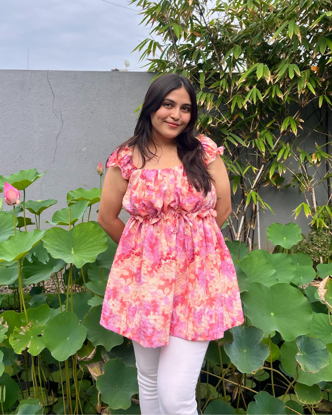 Coral peplum top